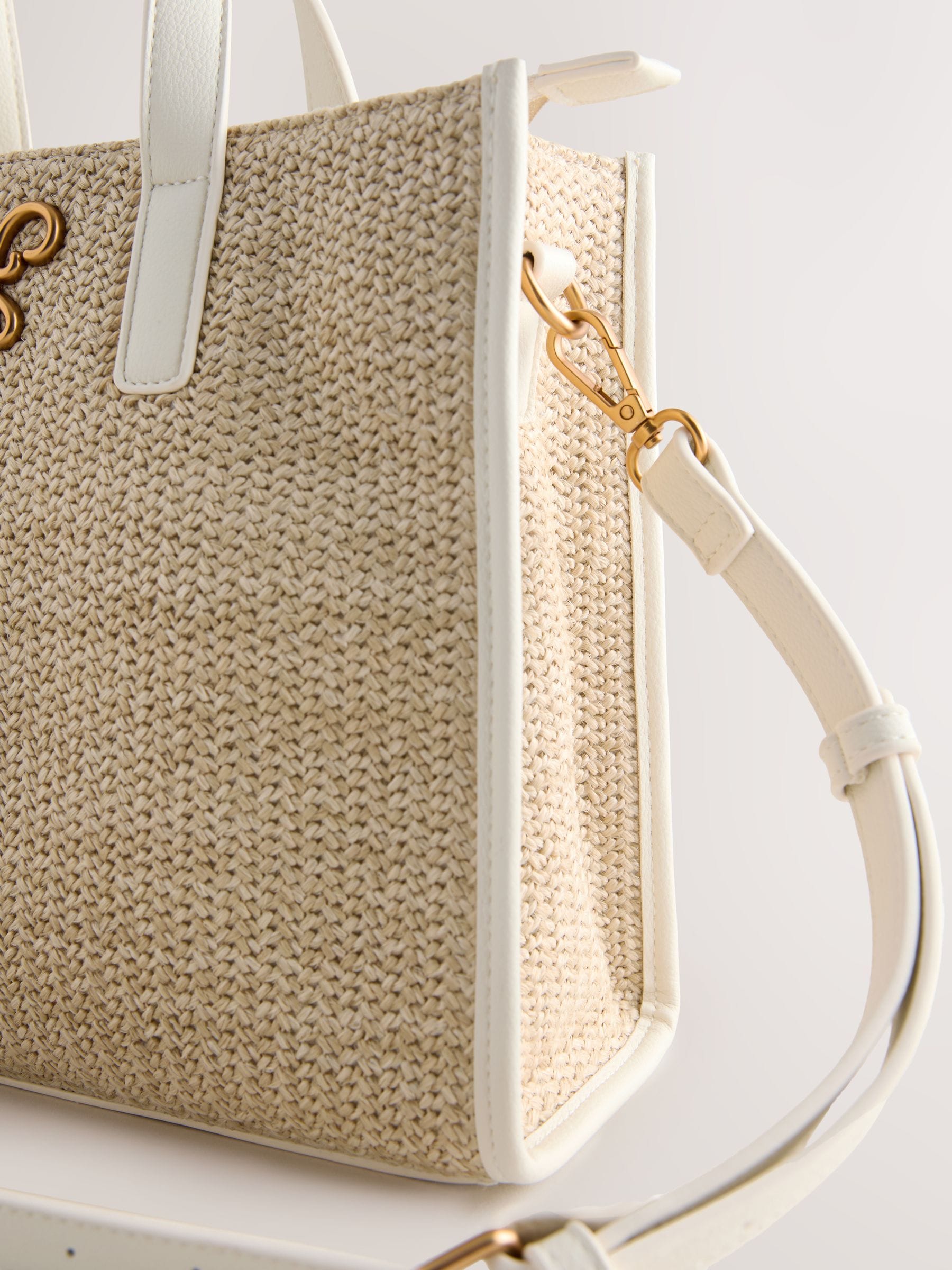 Raffia effect shoulder bag with recycled polyester lining (British brand)