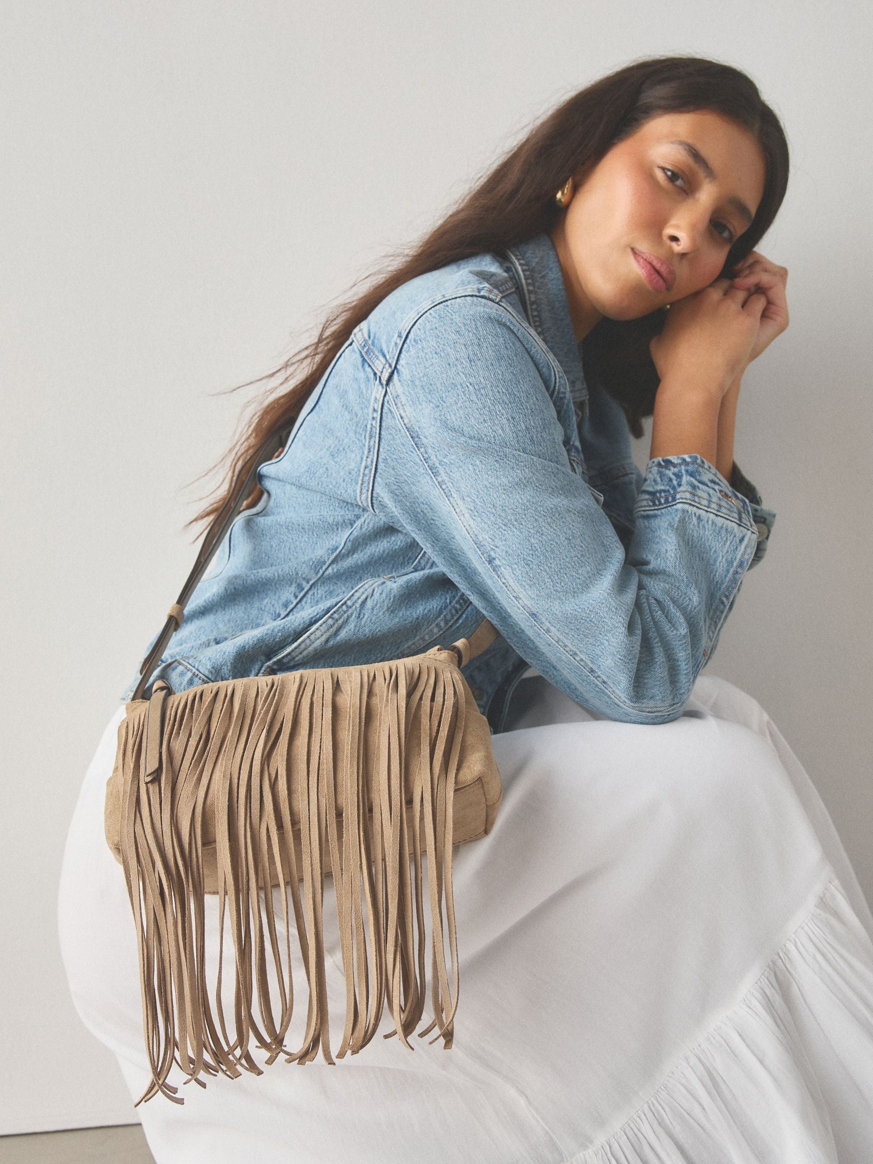 Stone suedette cross-body bag with fringe detail (British brand)