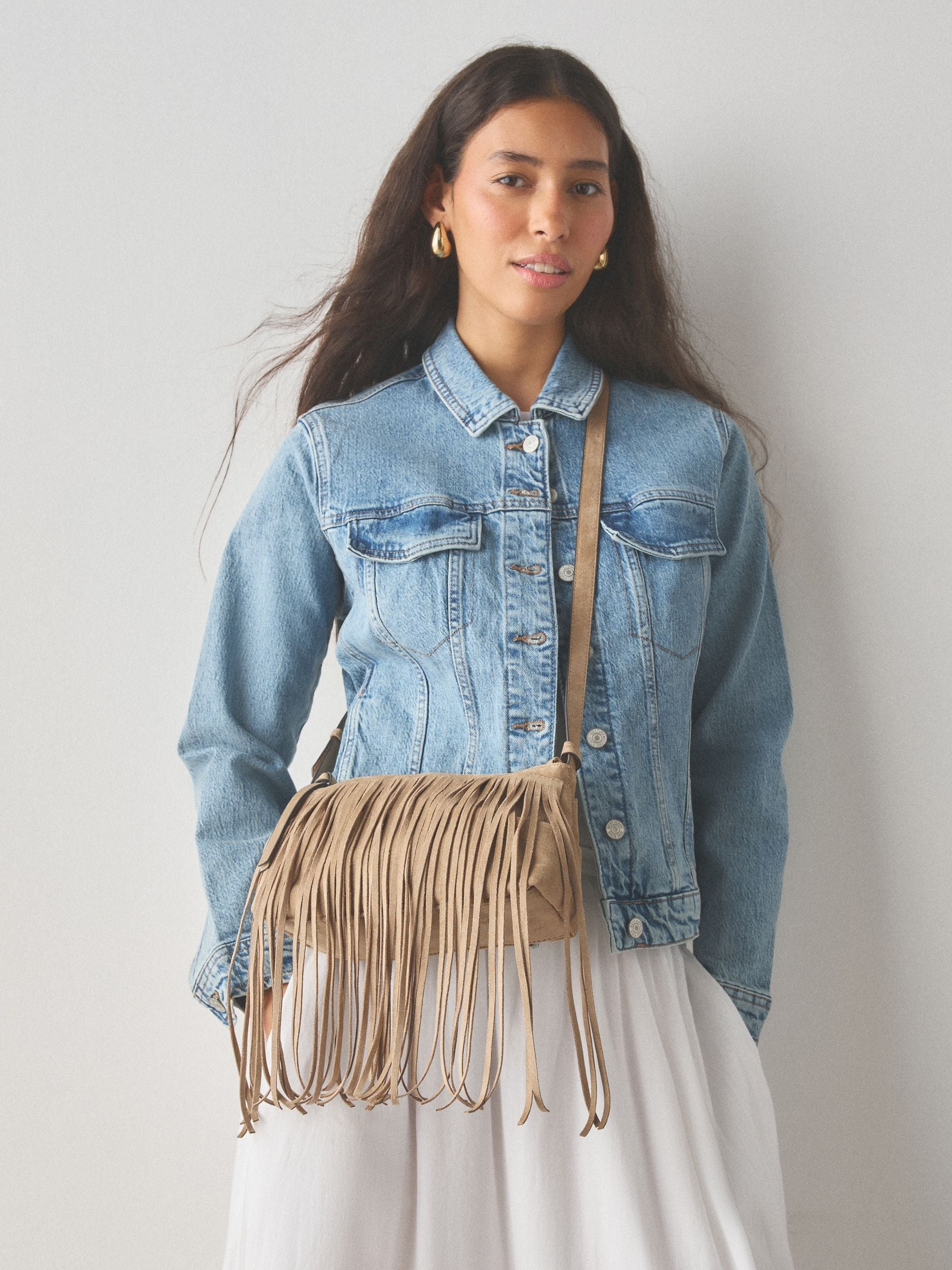 Stone suedette cross-body bag with fringe detail (British brand)