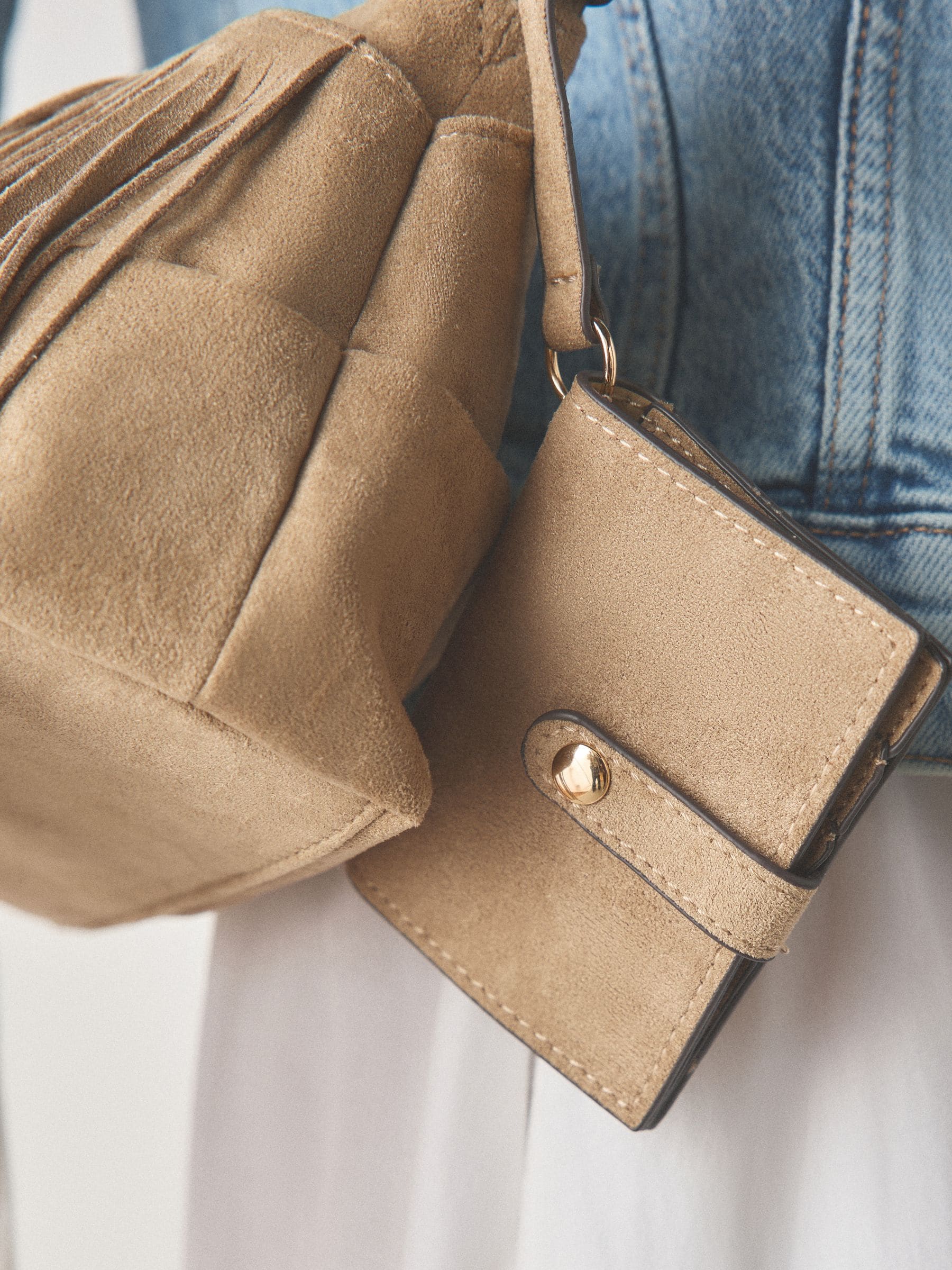 Stone suedette cross-body bag with fringe detail (British brand)