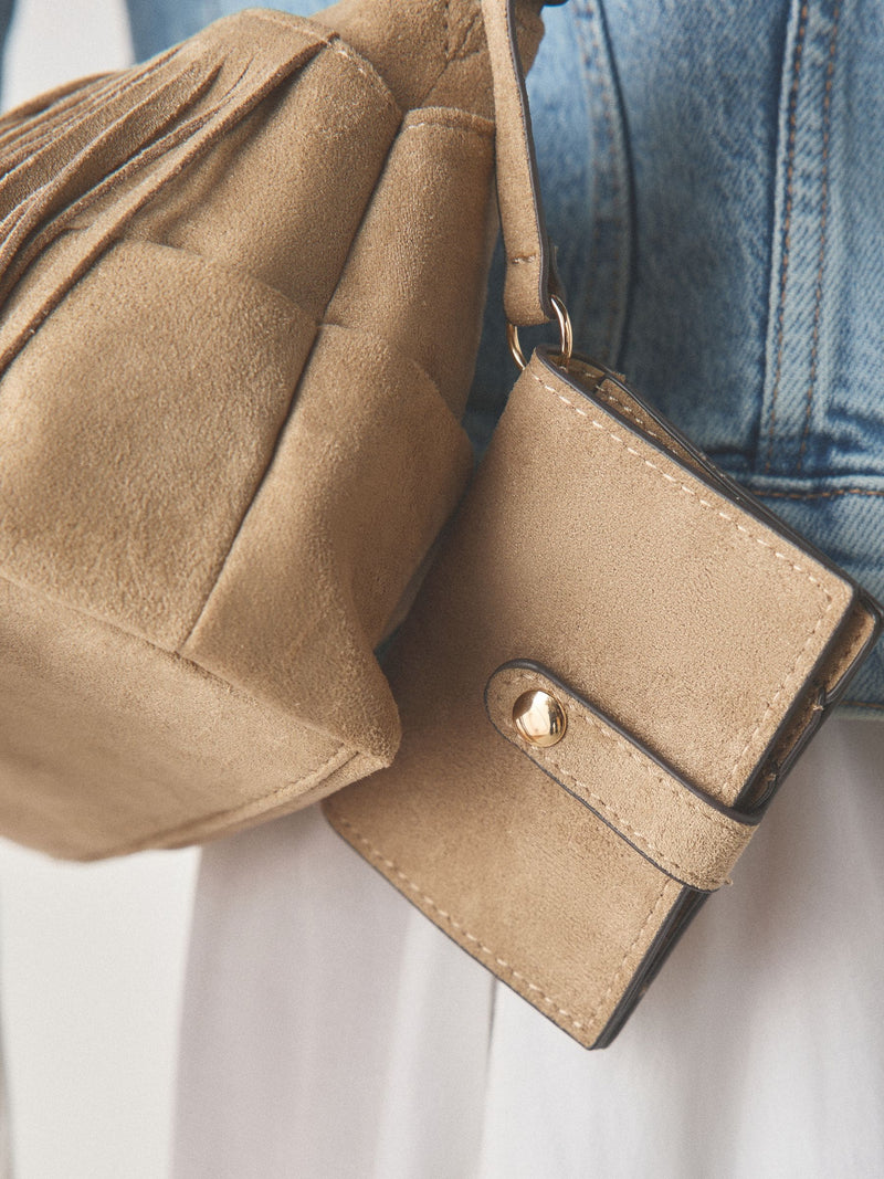 Stone suedette cross-body bag with fringe detail (British brand)
