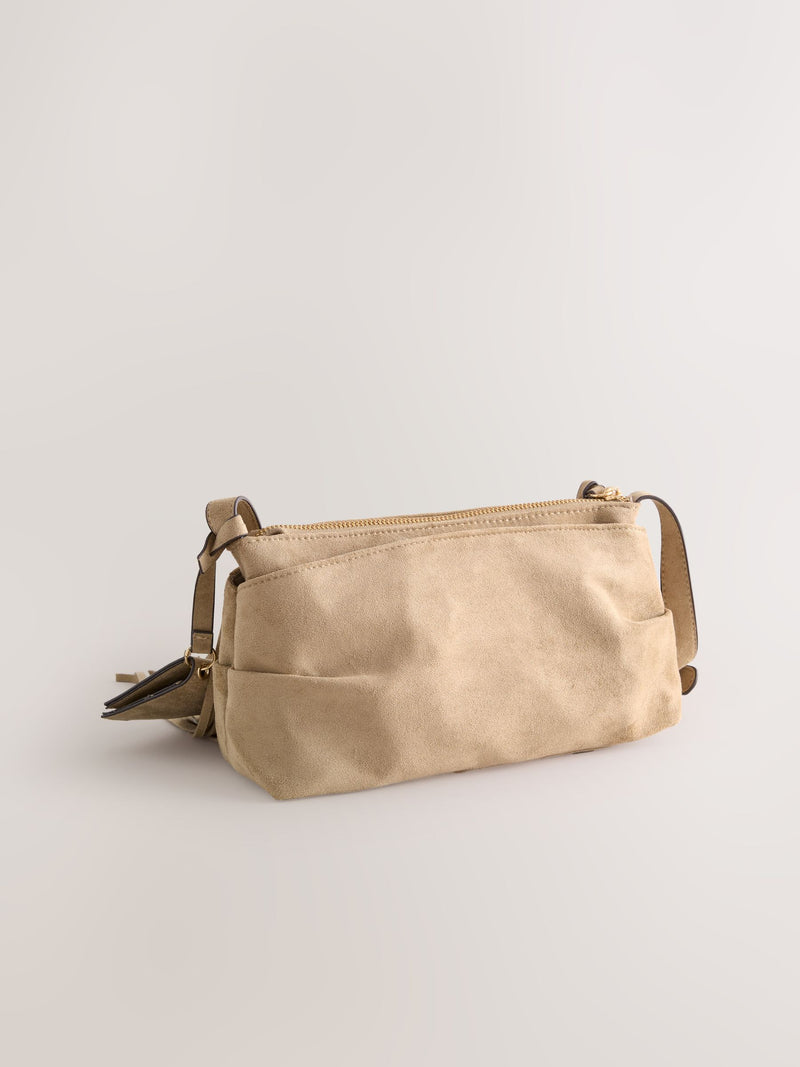Stone suedette cross-body bag with fringe detail (British brand)