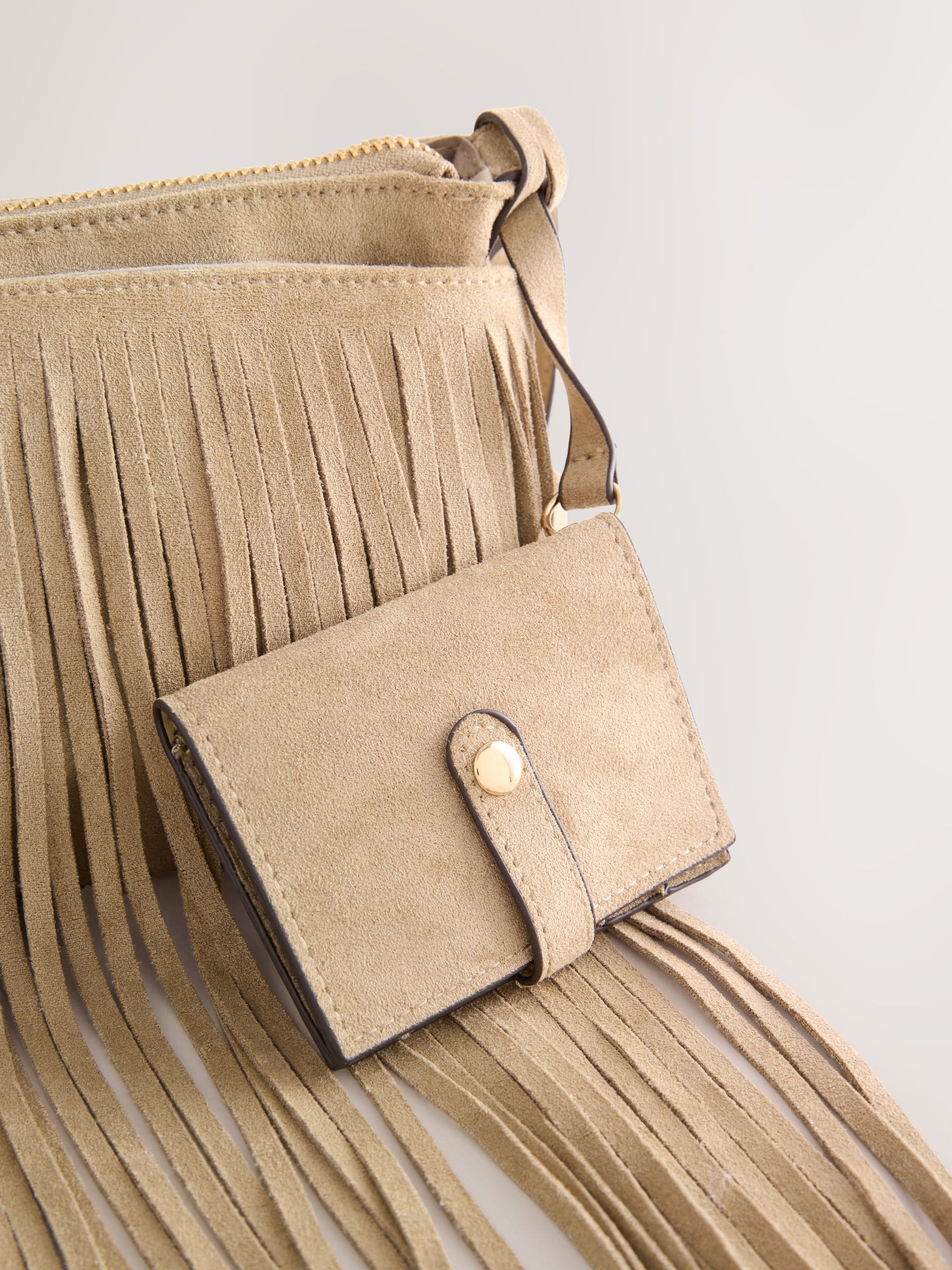 Stone suedette cross-body bag with fringe detail (British brand)