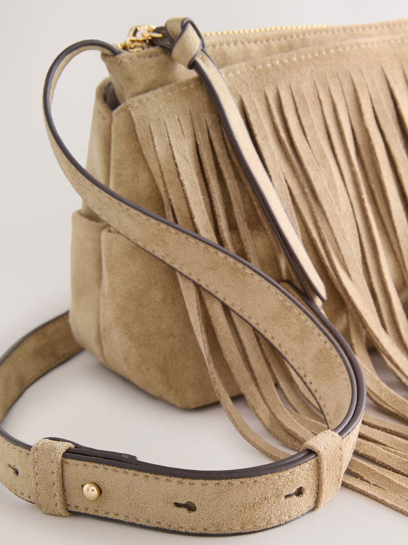Stone suedette cross-body bag with fringe detail (British brand)