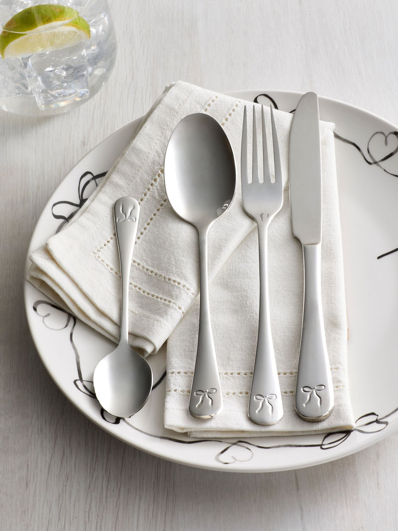 Silver bow cutlery set 16 piece, imported from the UK