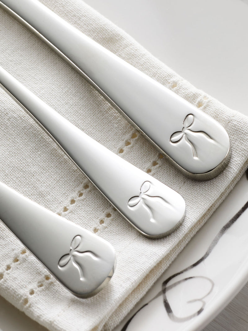 Silver bow cutlery set 16 piece, imported from the UK