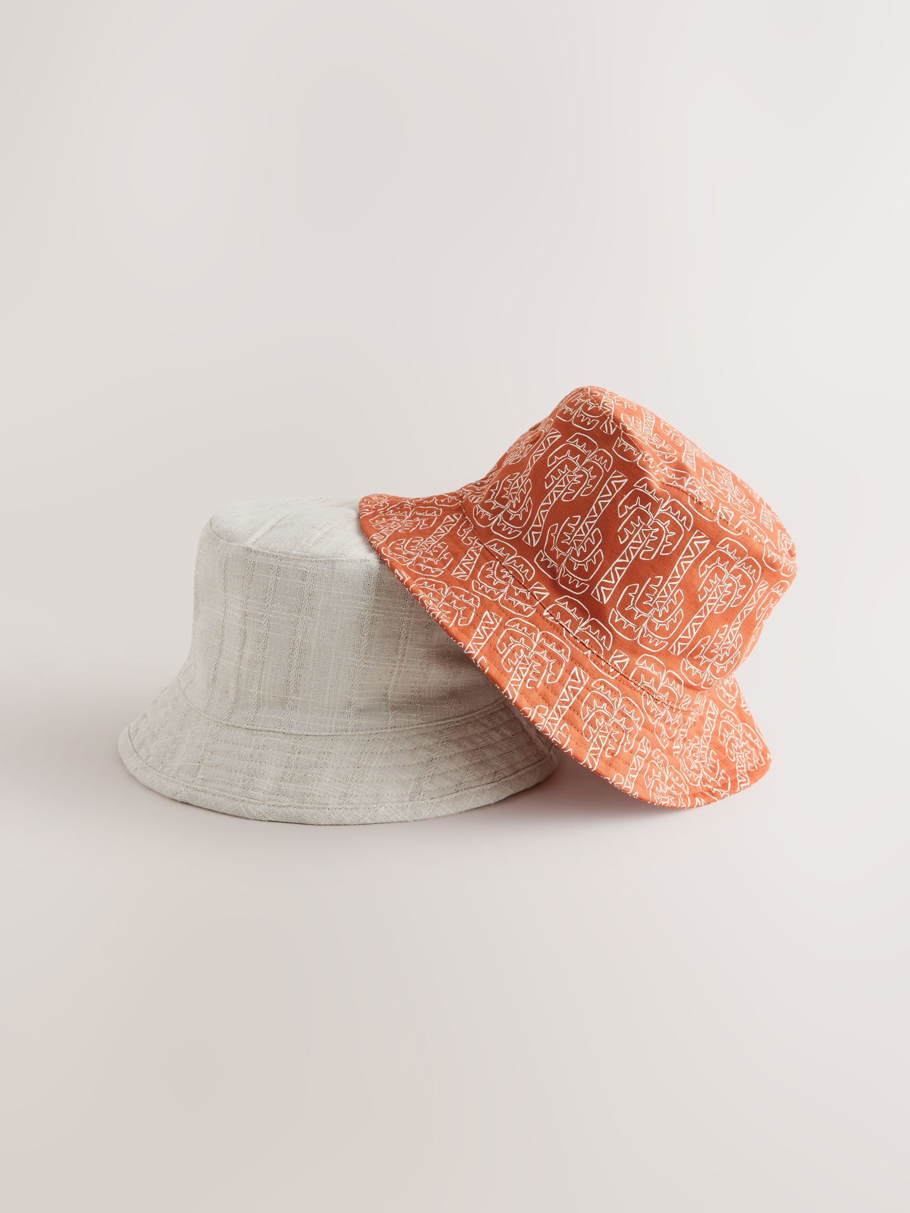 Bucket hat 2 pack ecru rust orange palm tree print, imported from the UK