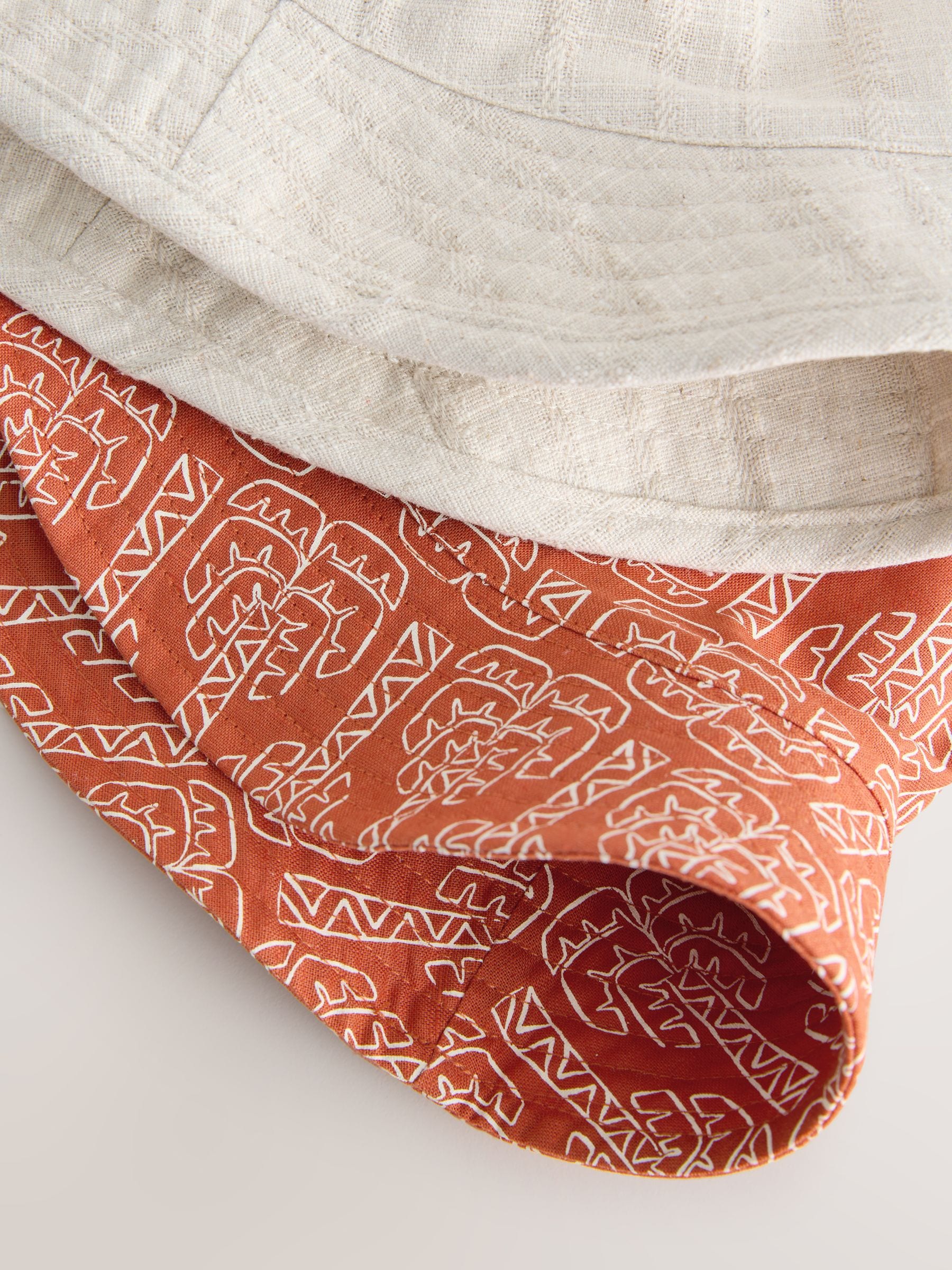 Bucket hat 2 pack ecru rust orange palm tree print, imported from the UK