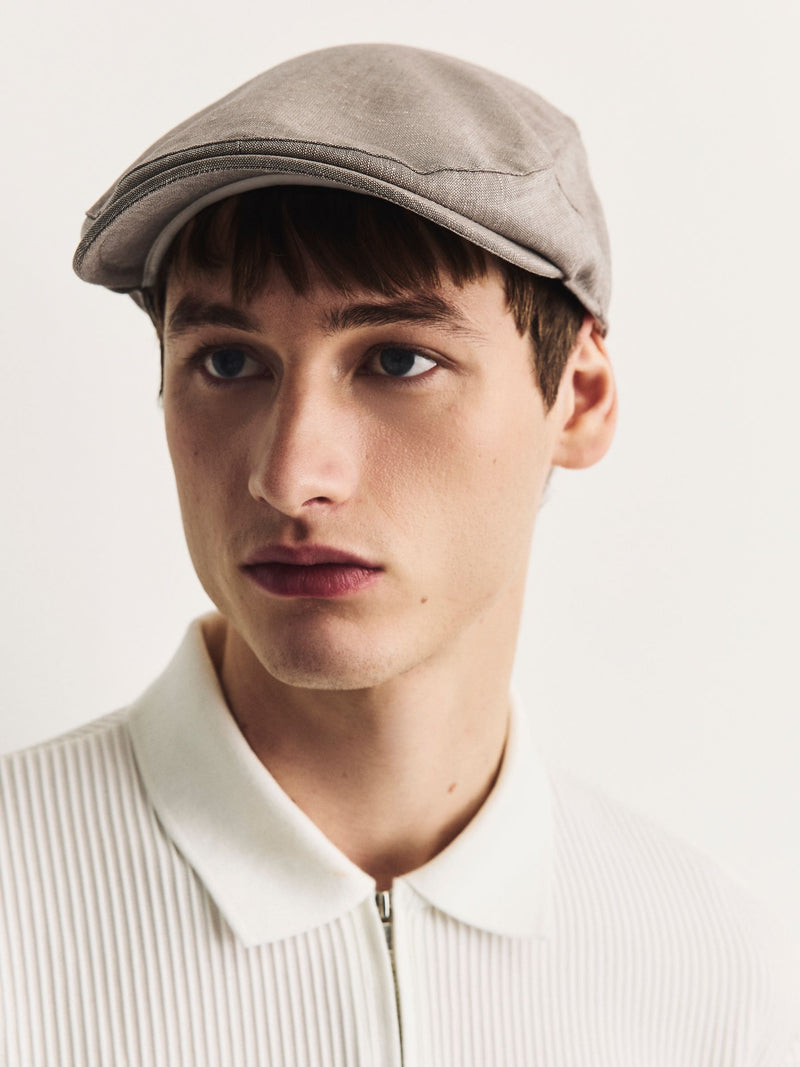 Dark natural flat cap, imported from the UK