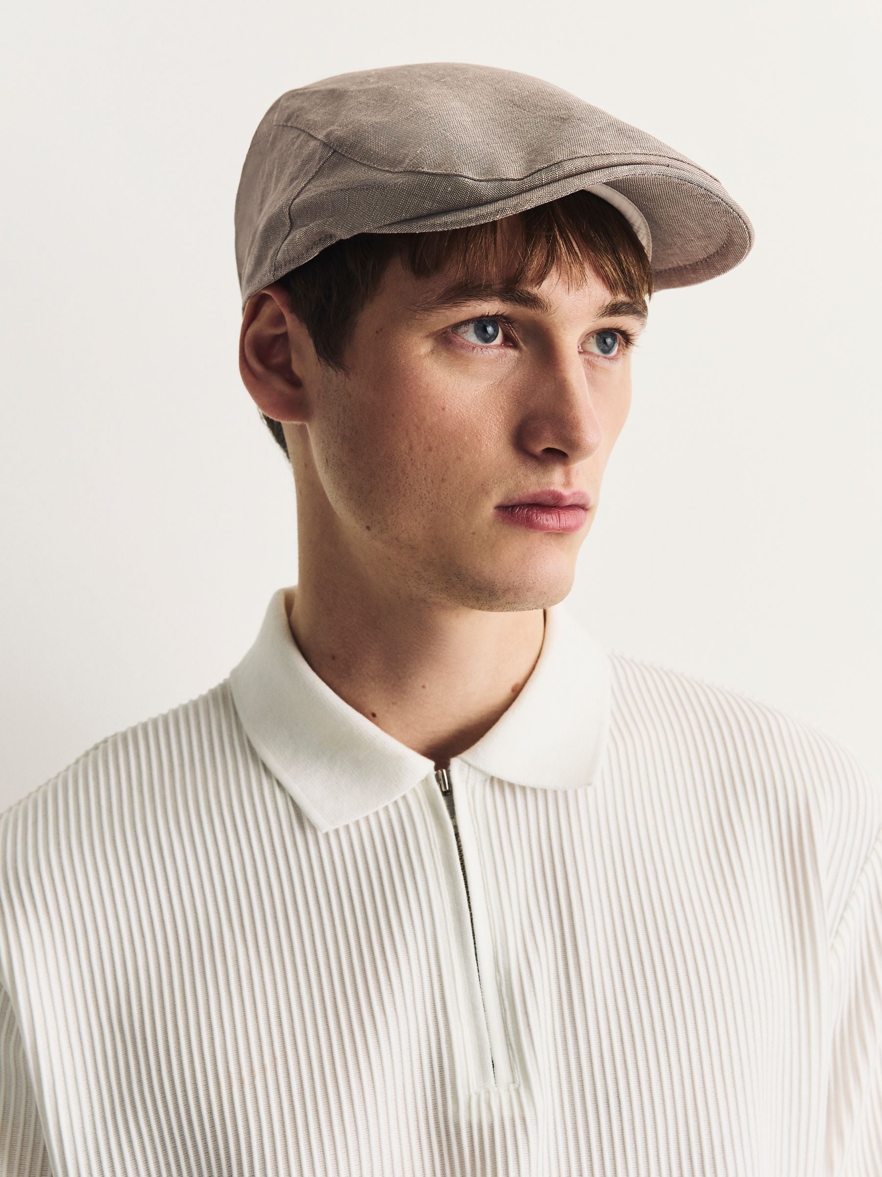 Dark natural flat cap, imported from the UK