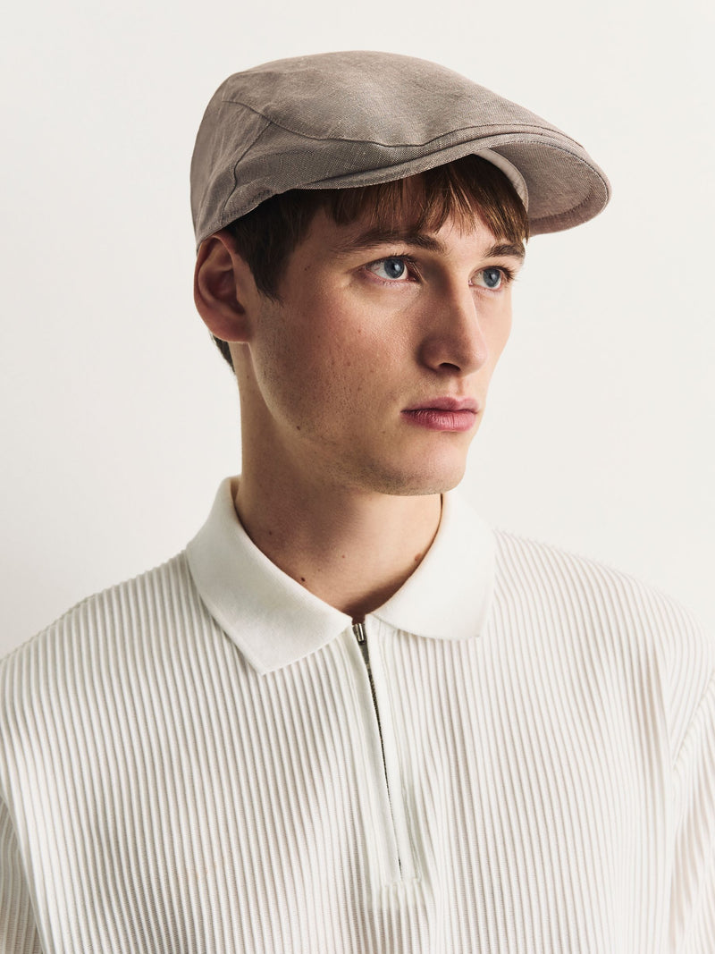Dark natural flat cap, imported from the UK