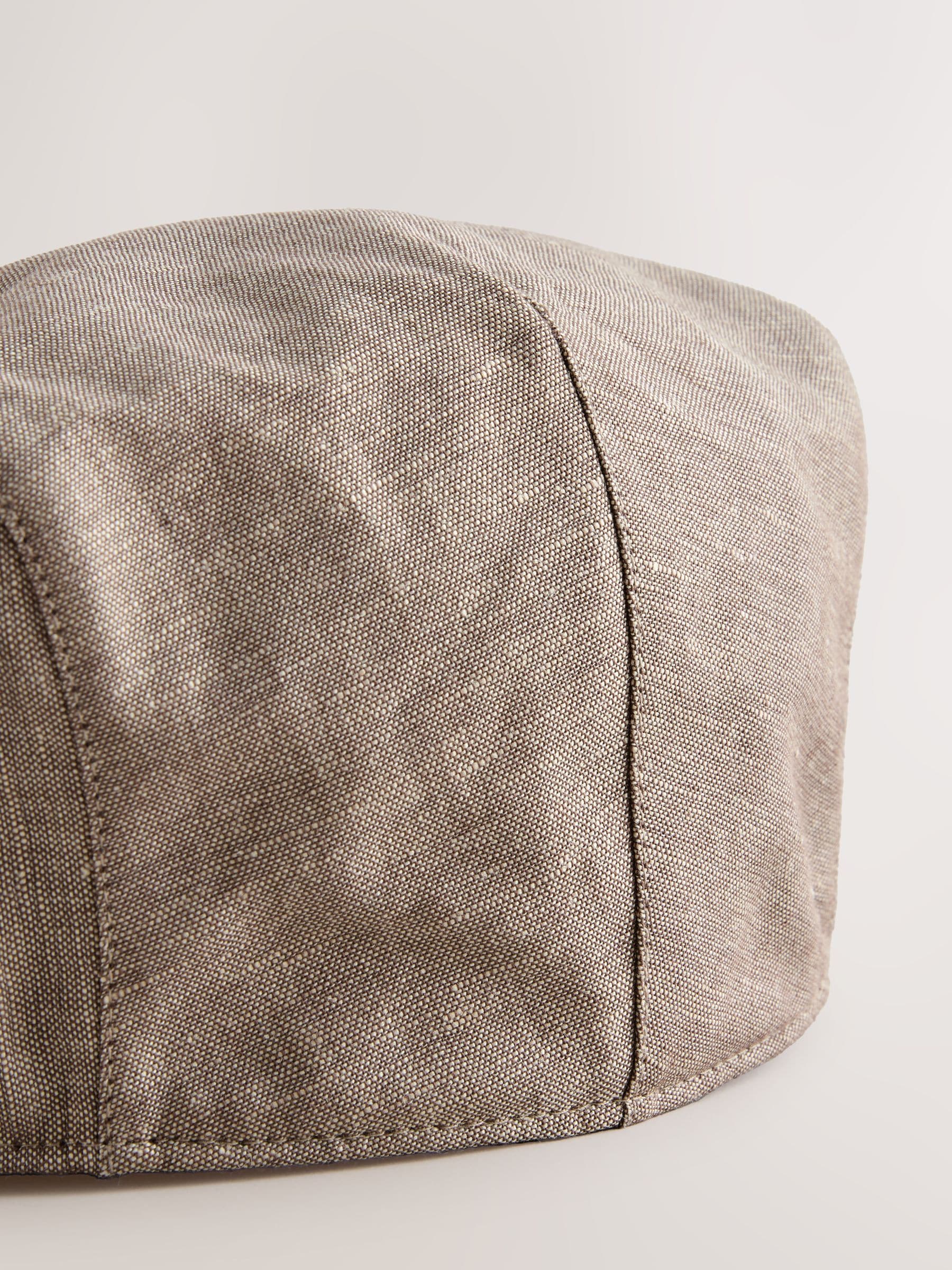 Dark natural flat cap, imported from the UK