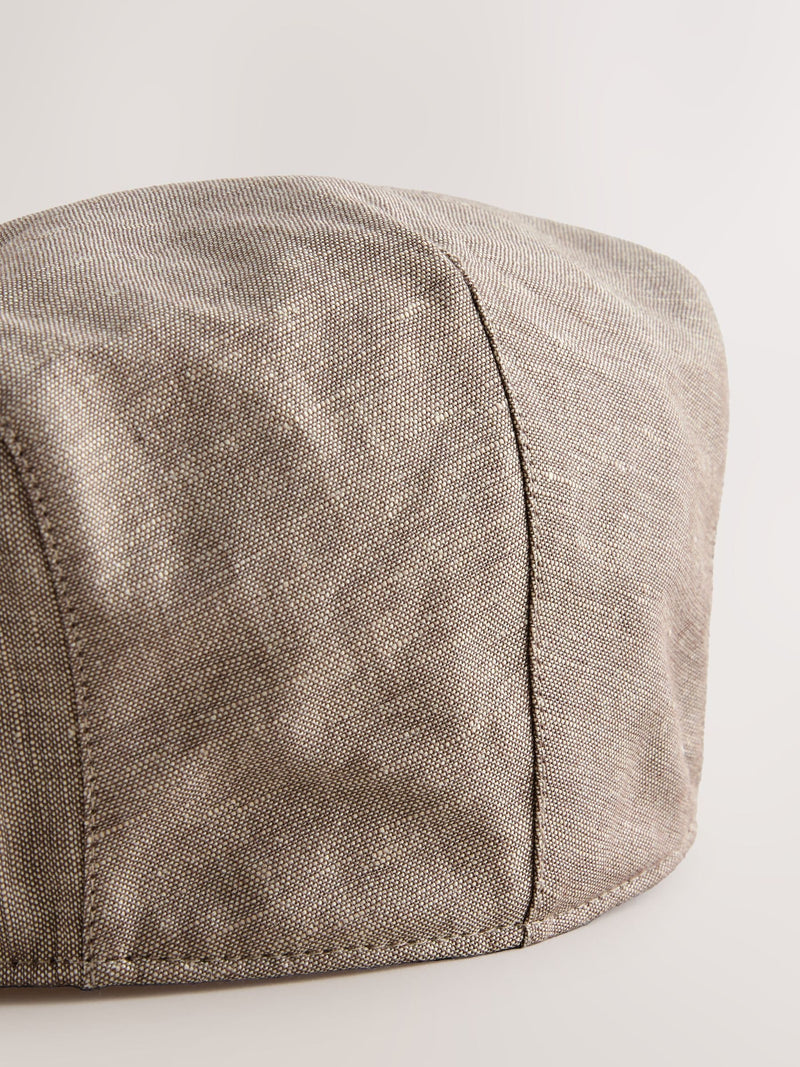 Dark natural flat cap, imported from the UK