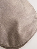 Dark natural flat cap, imported from the UK