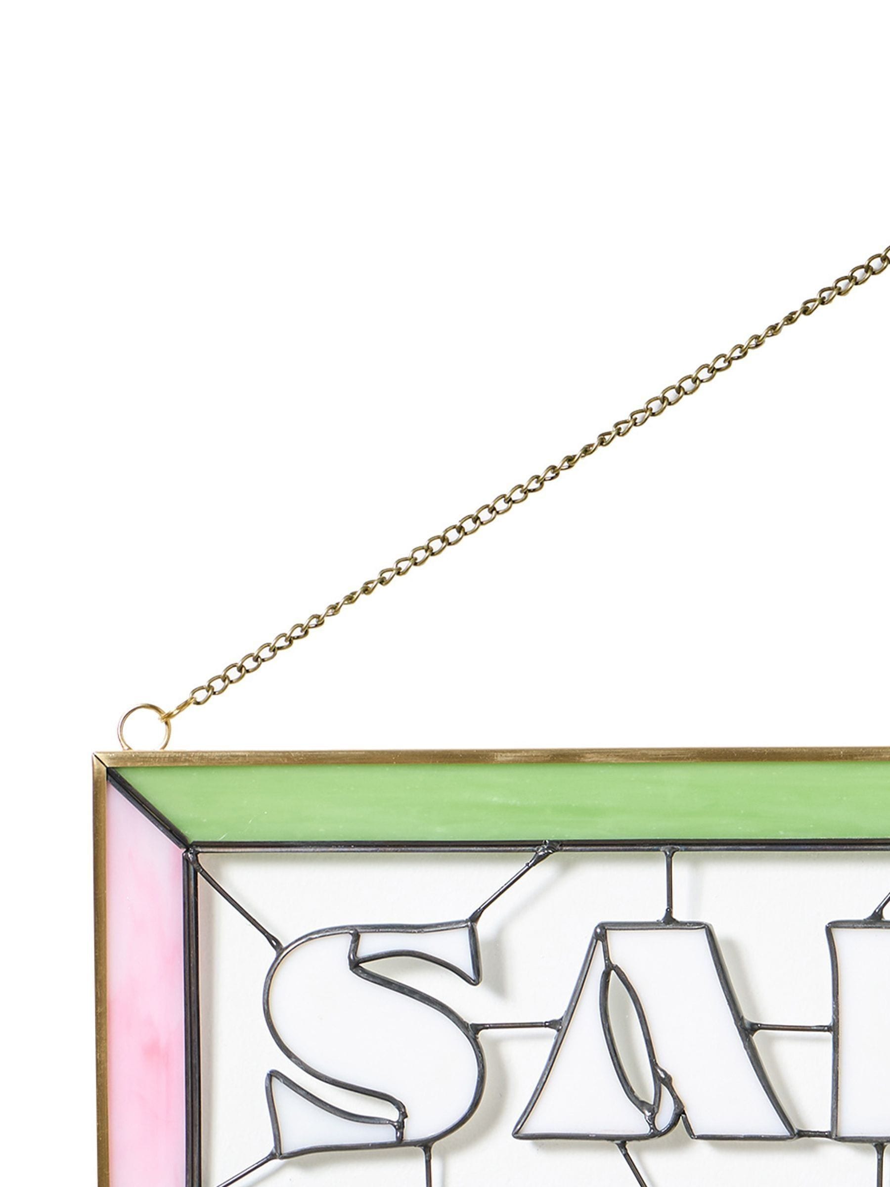 Oliver Bonas Pink Salut glass wall art, imported from the UK