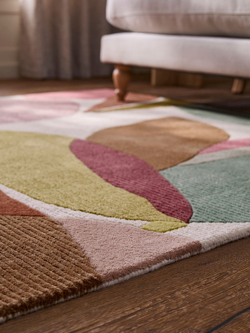 Multi abstract leaf wool rug with tufted textured finish (British brand)