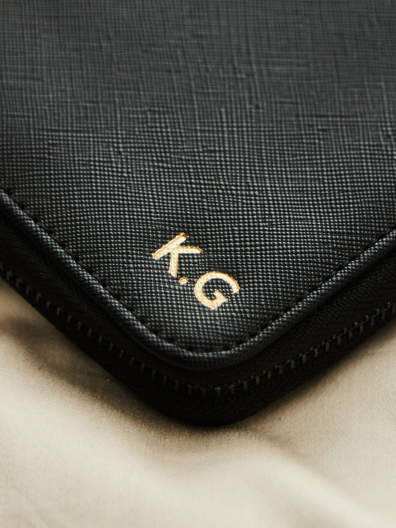 Made Yours personalised black embossed travel case - British product