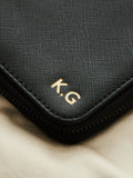 Made Yours personalised black embossed travel case - British product