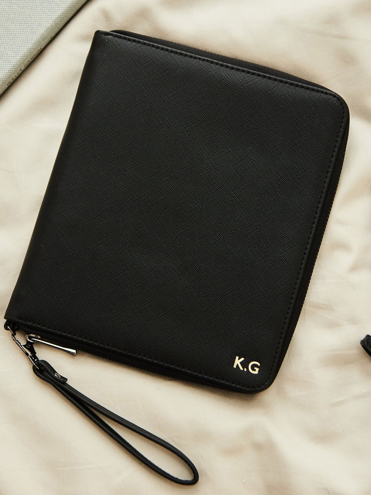 Made Yours personalised black embossed travel case - British product