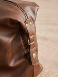 Personalised tan faux leather weekend bag, imported from the UK
