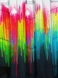 Hype White Drips backpack with multi-colour splatter design, imported from the UK