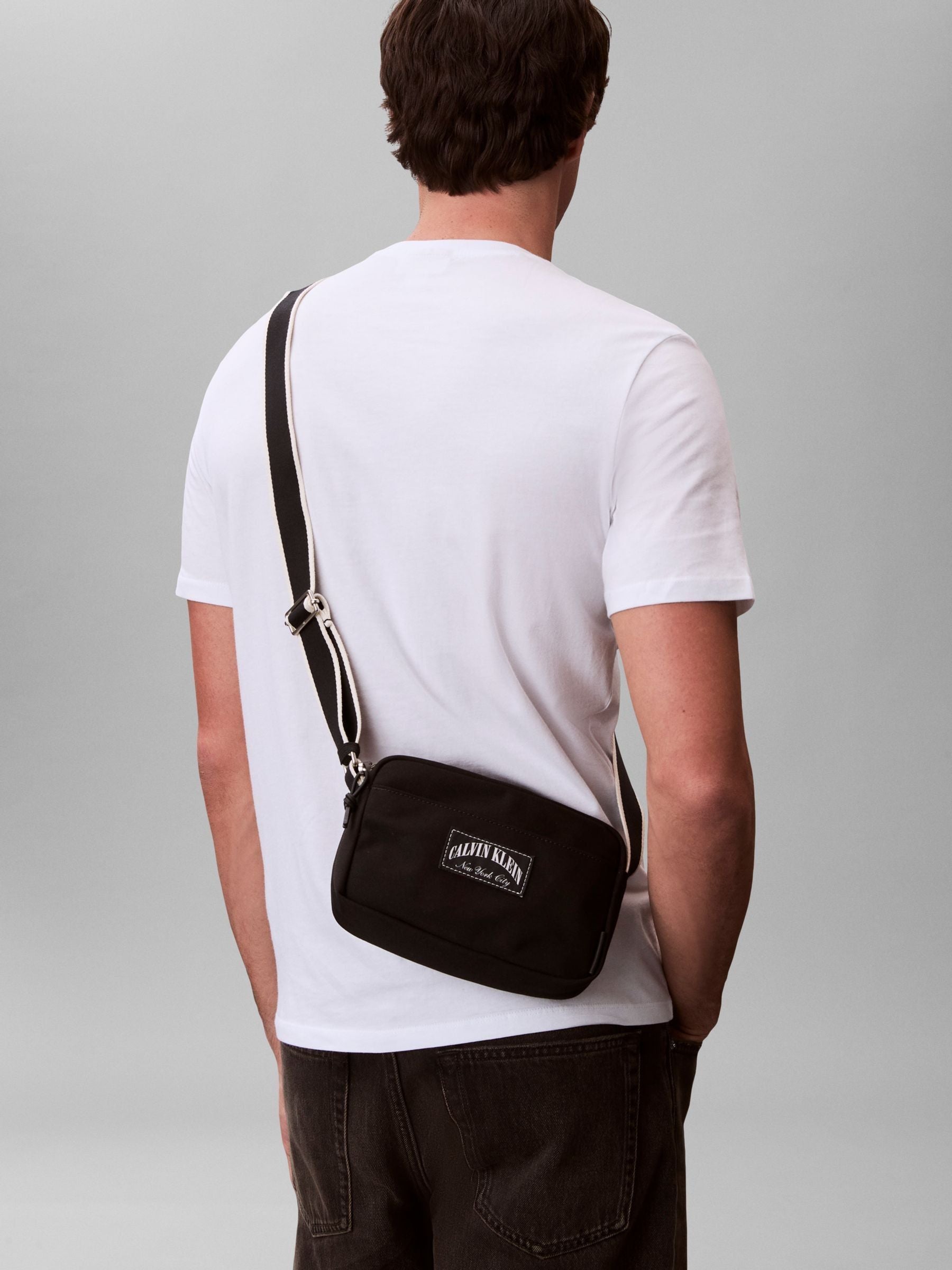 Calvin Klein black cross-body bag, imported from the UK