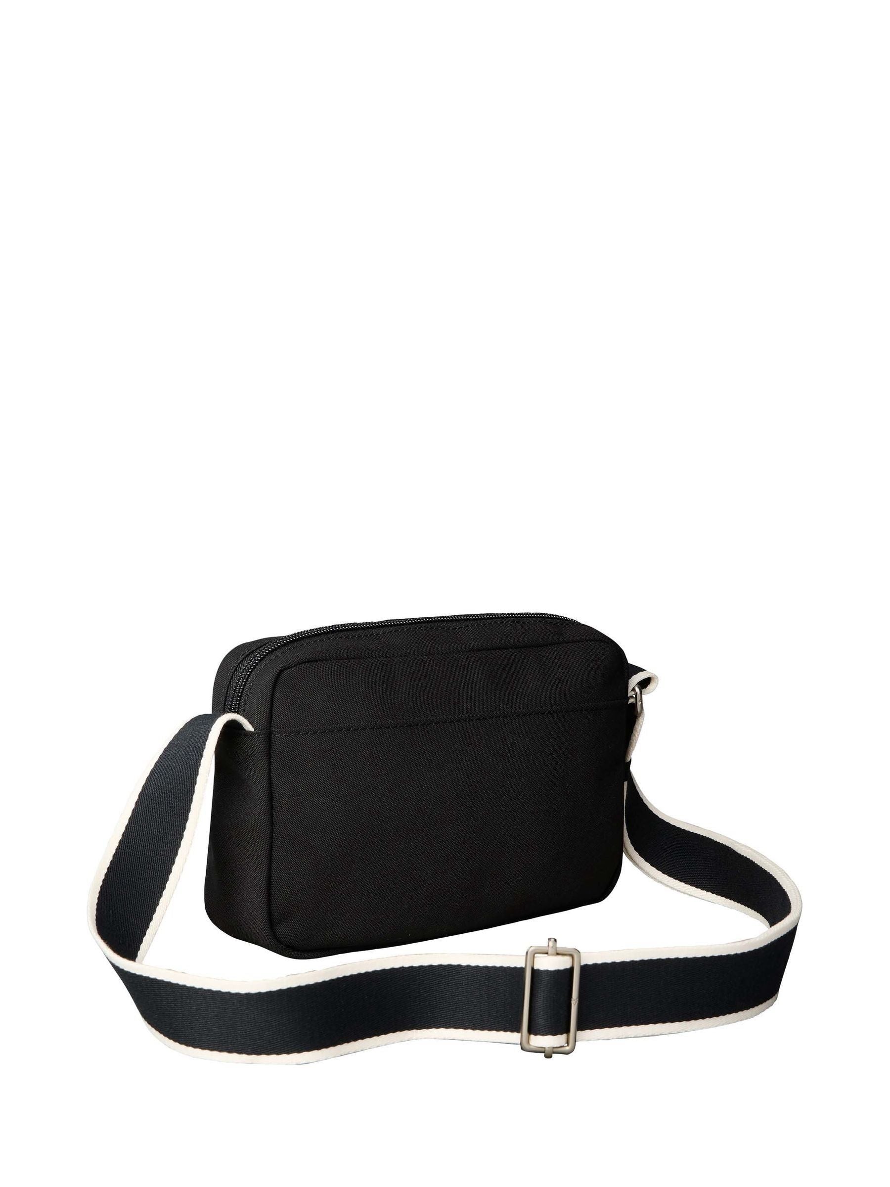 Calvin Klein black cross-body bag, imported from the UK
