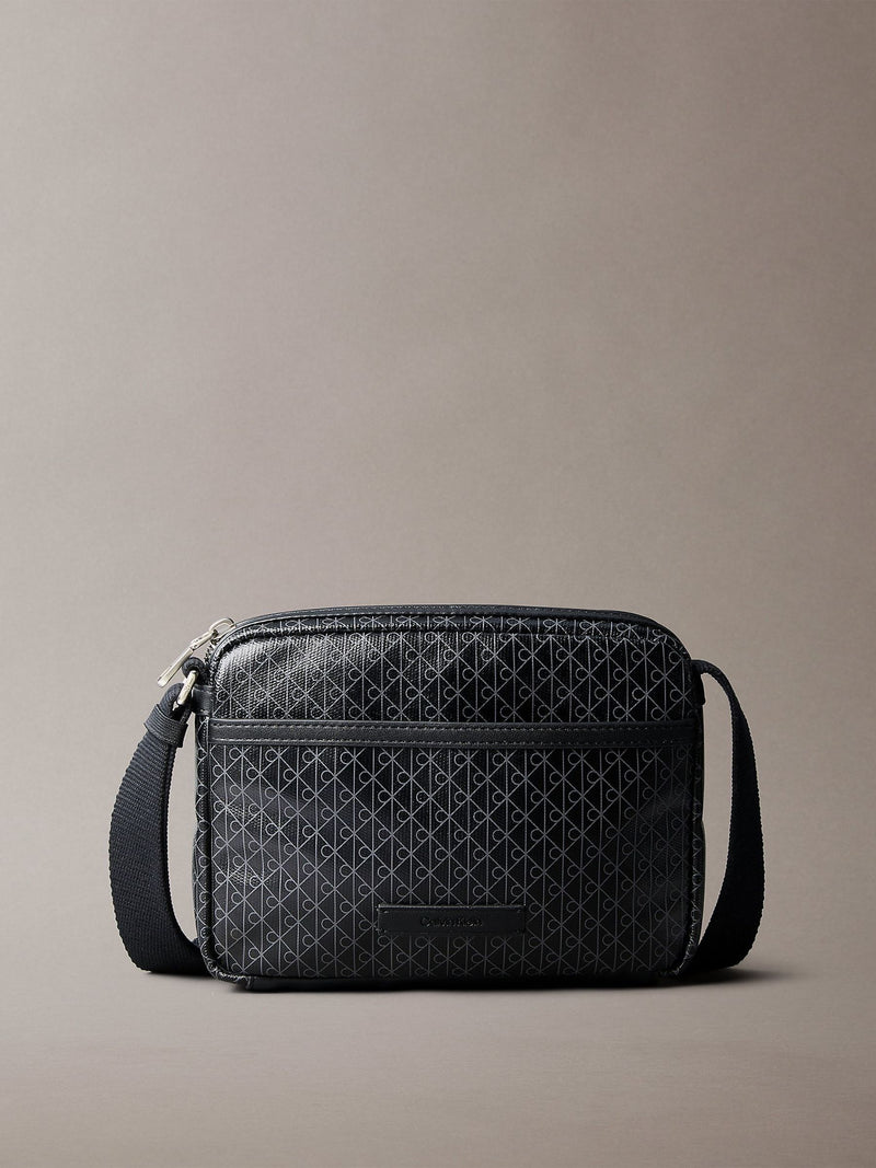 Calvin Klein black cross-body bag, imported from the UK