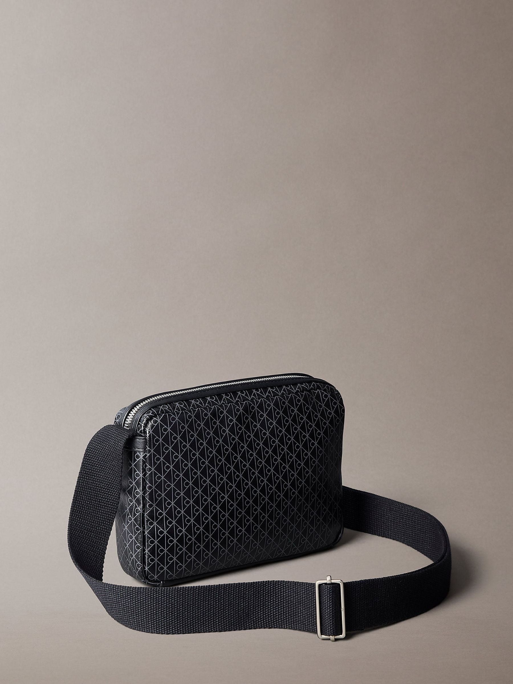 Calvin Klein black cross-body bag, imported from the UK