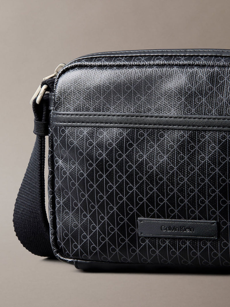 Calvin Klein black cross-body bag, imported from the UK