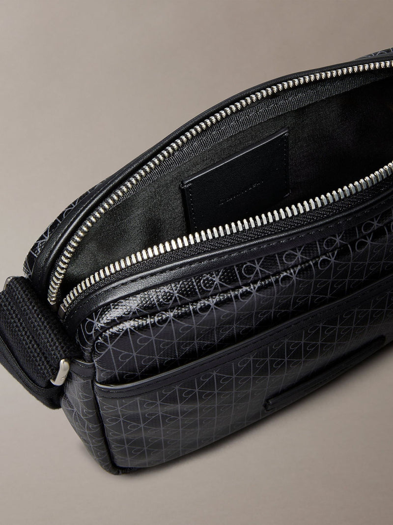 Calvin Klein black cross-body bag, imported from the UK