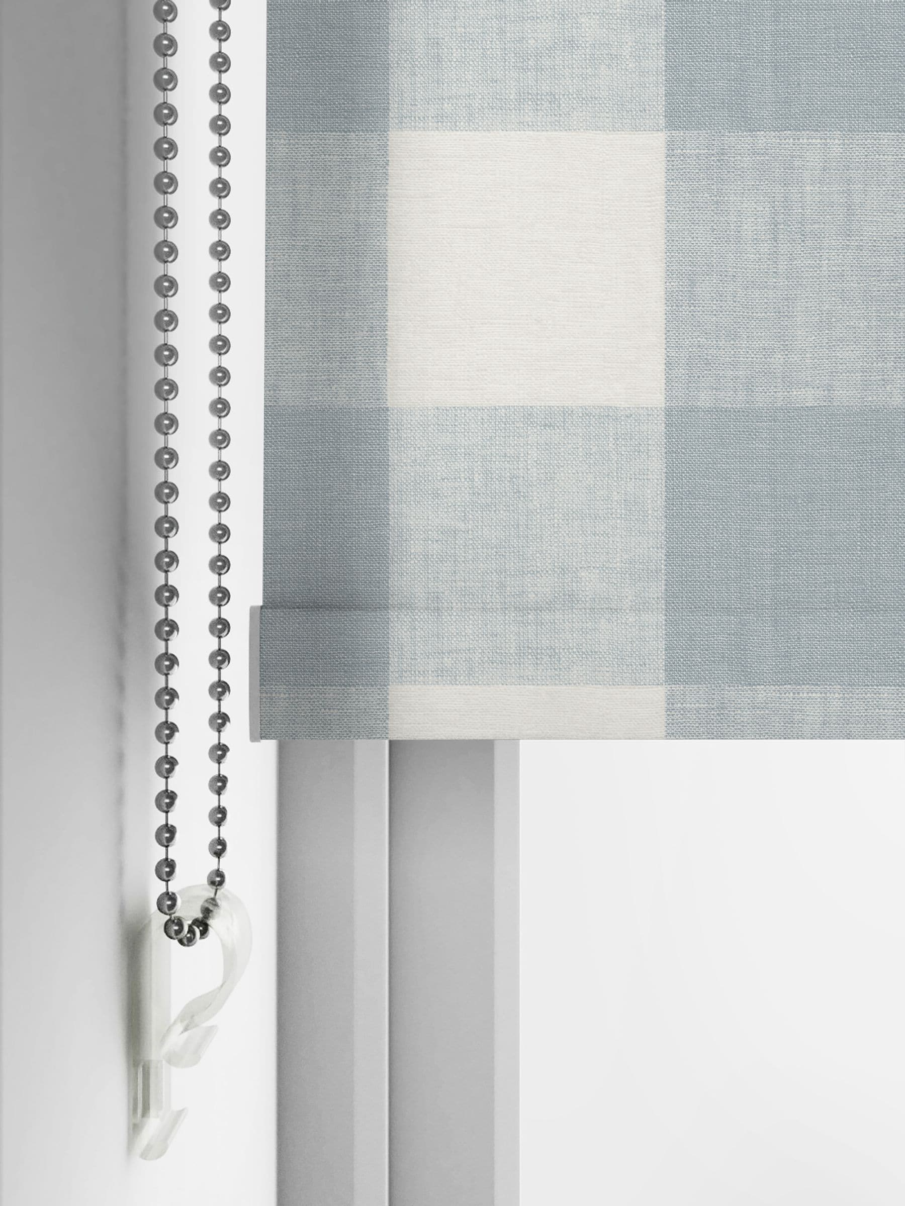 Sophie Allport pale blue gingham roller blind, imported from the UK