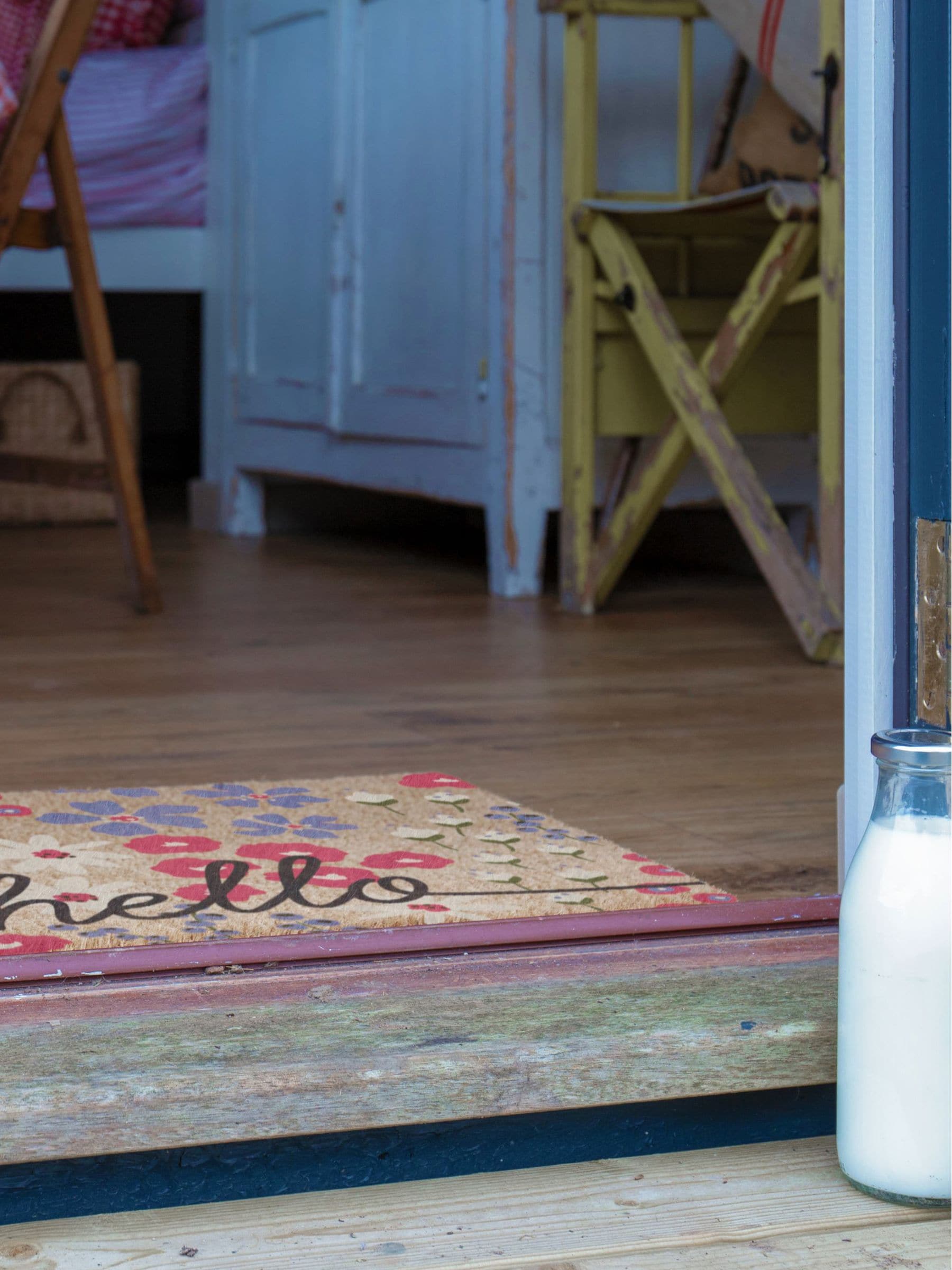 Artsy Mats Brown Hello Scribbly Floral doormat (British brand)