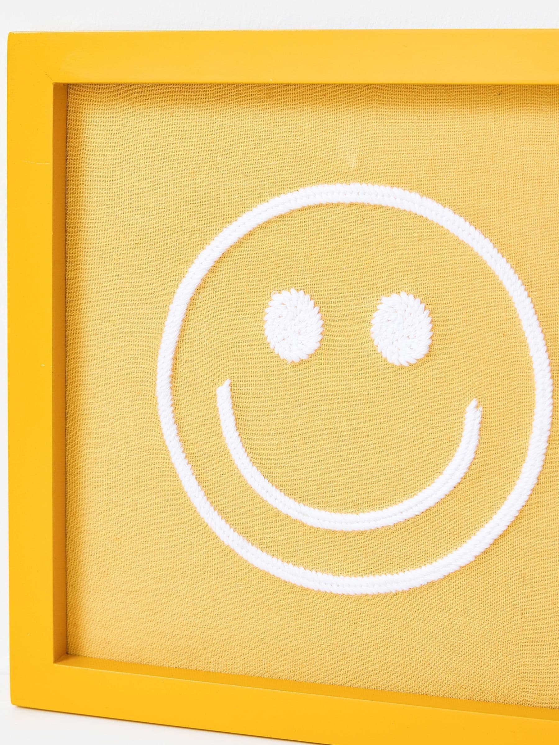 Oliver Bonas yellow embroidered happy face wall art 23cm, imported from the UK