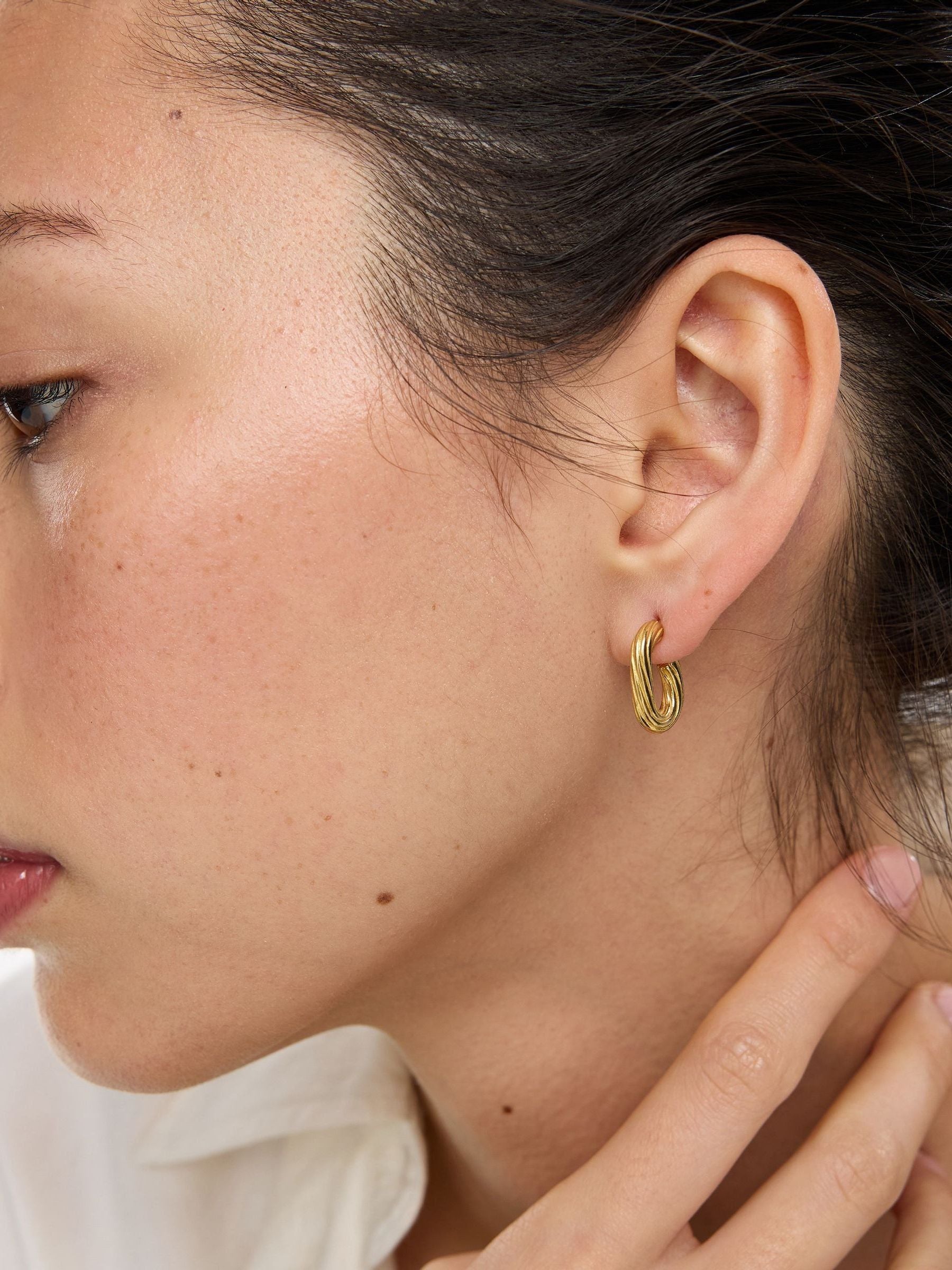 Oliver Bonas gold tone etched oval hoop earrings, UK version