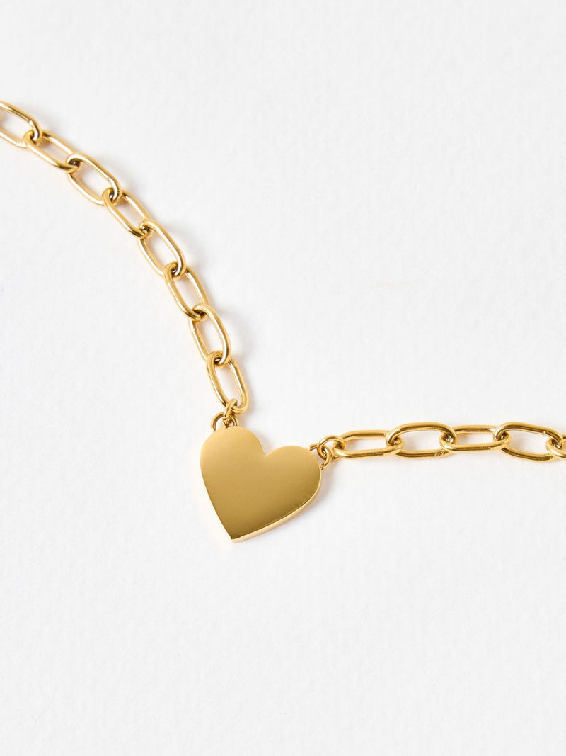 Oliver Bonas Talula gold-tone stainless steel heart pendant necklace, imported from the UK