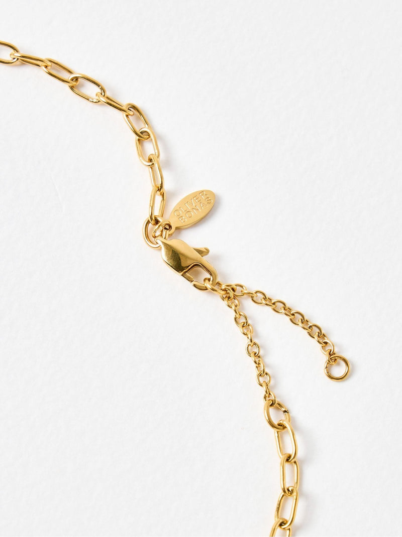 Oliver Bonas Talula gold-tone stainless steel heart pendant necklace, imported from the UK