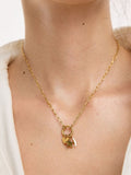 Oliver Bonas gold charm necklace, UK version