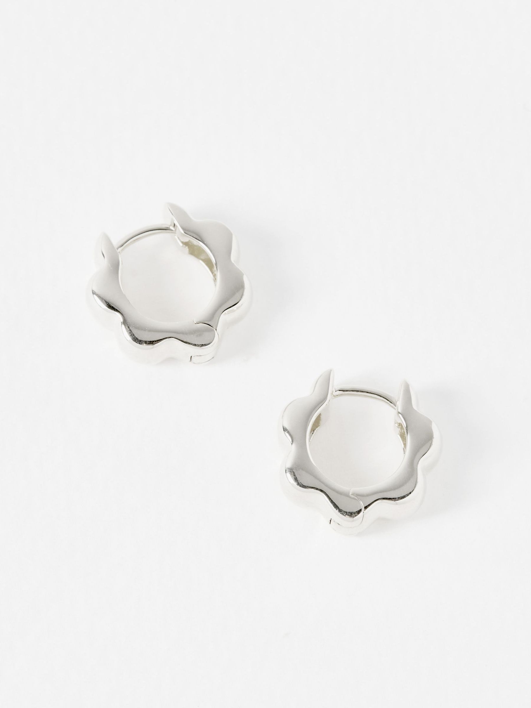 Oliver Bonas sterling silver scalloped flower clicker hoop earrings, UK version