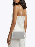 Carvela Silver Gemma clutch bag with crystal embellishment, imported from the UK