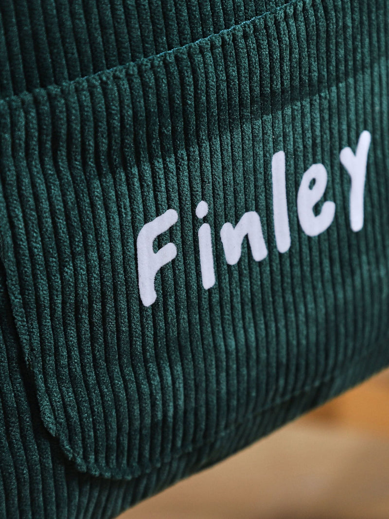 My 1st Years mini forest green cord backpack, imported from the UK