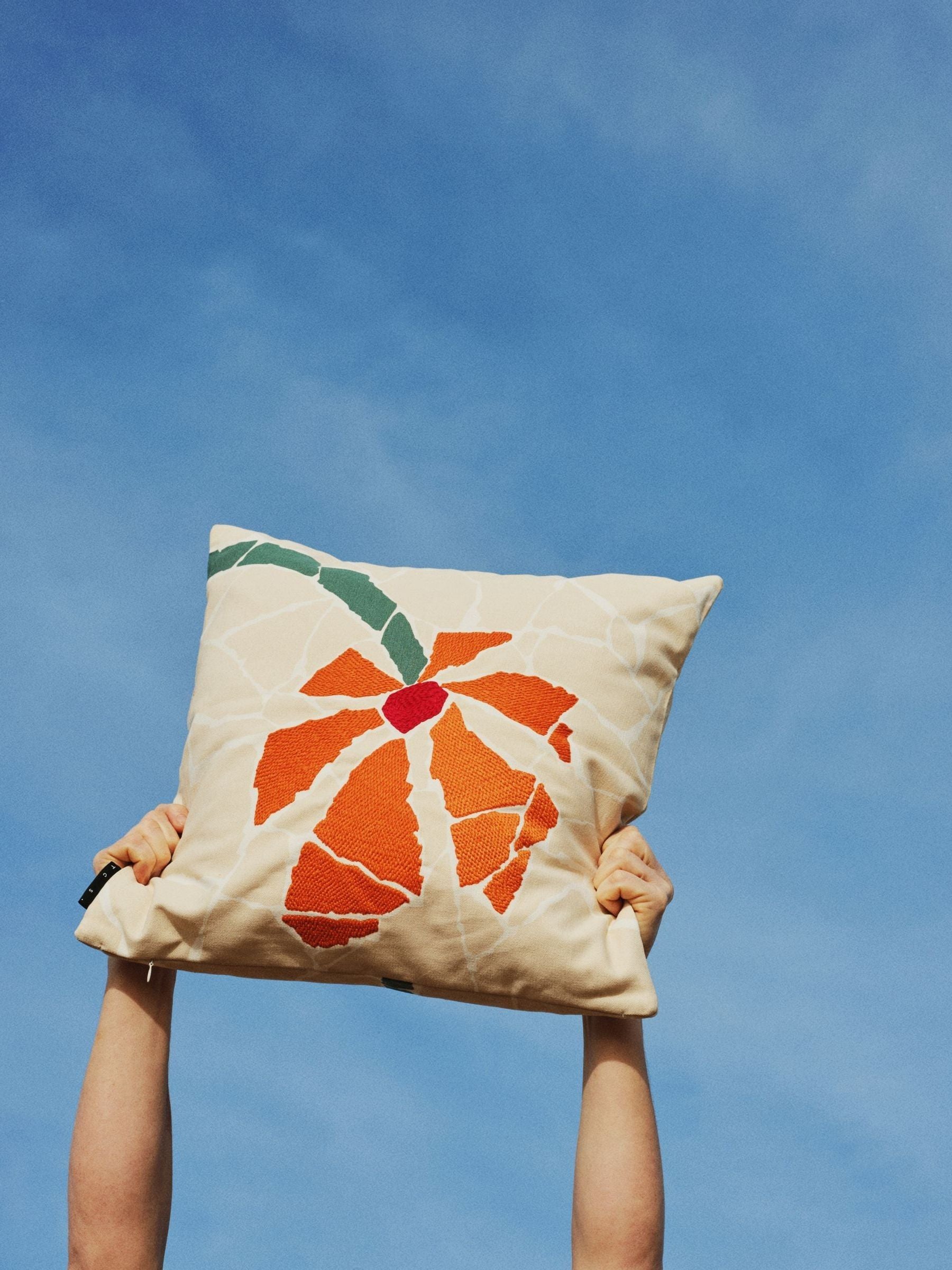 The Conran Shop cream orange flower cushion 50x50cm, imported from the UK