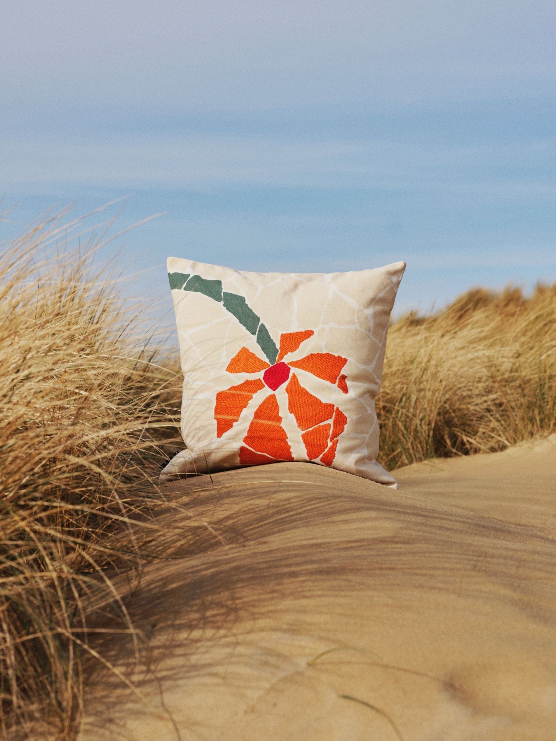 The Conran Shop cream orange flower cushion 50x50cm, imported from the UK