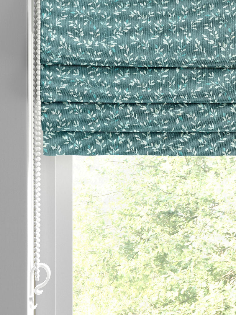 Azure Blue Shelby roman blind with floral cotton print, imported from the UK