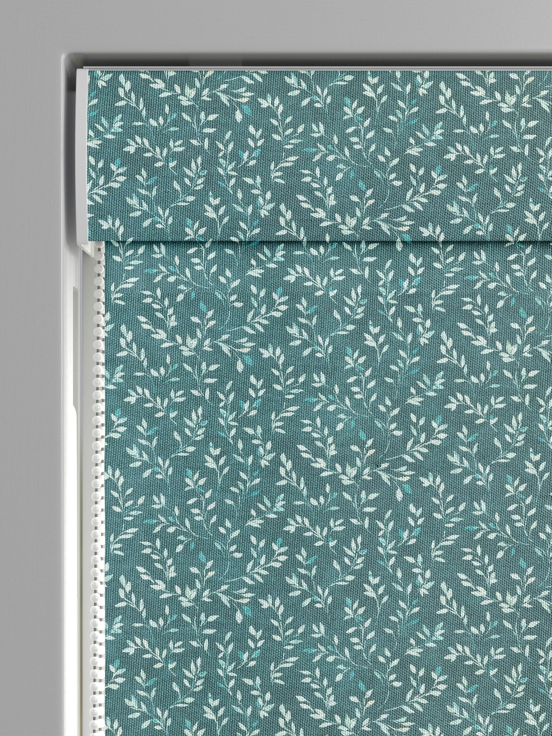 Azure Blue Shelby roman blind with floral cotton print, imported from the UK