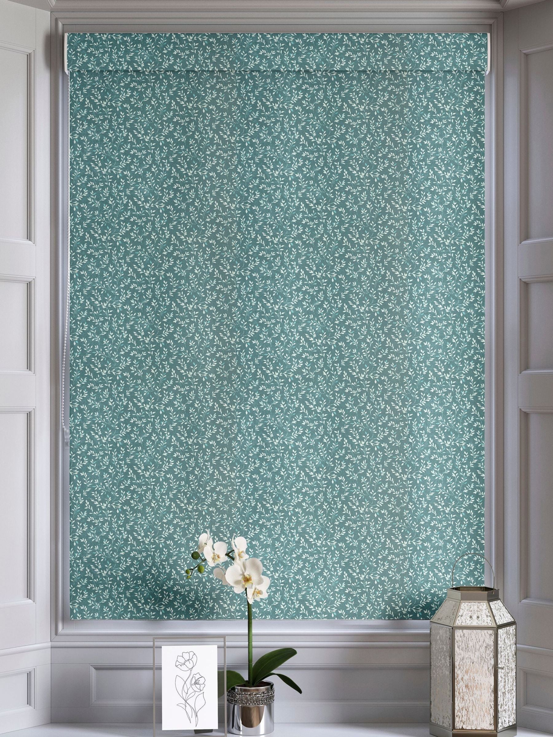 Azure Blue Shelby roman blind with floral cotton print, imported from the UK