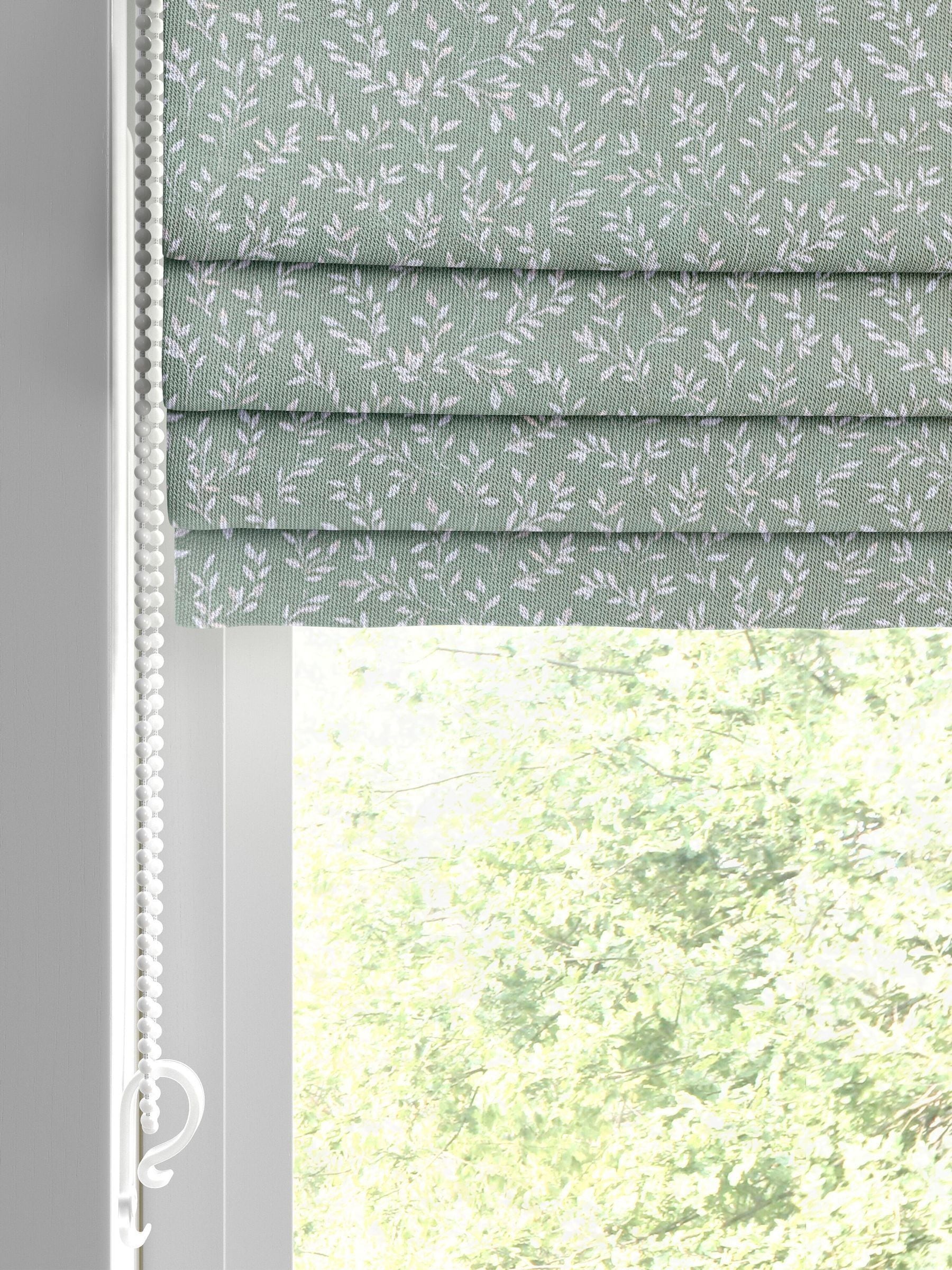 Sage green Shelby Roman blind with floral print, UK version