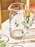 Oliver Bonas clear glass jug with tulip motifs (British brand)