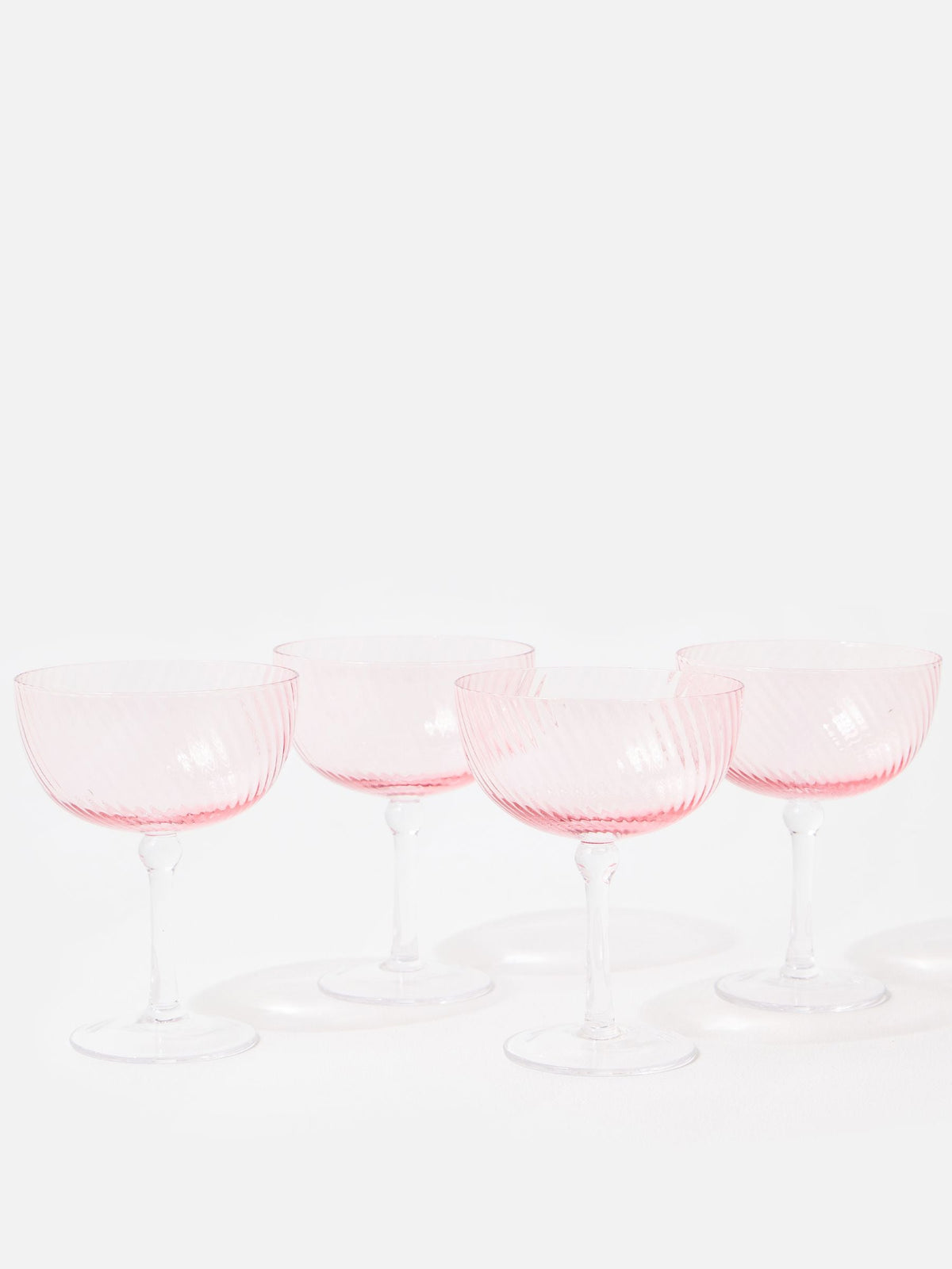 Oliver Bonas pink champagne saucer set of 4, imported from the UK