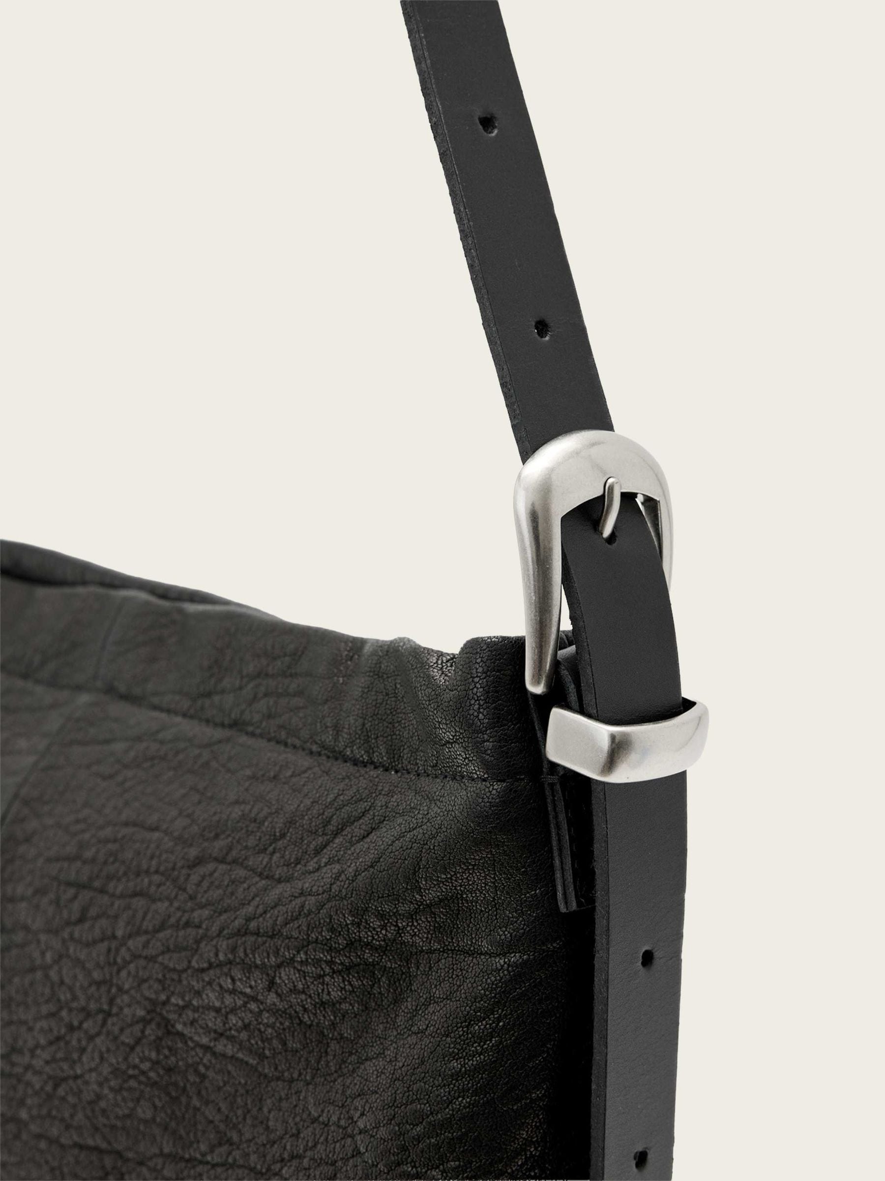 AllSaints Black Haven flat crossbody bag, imported from the UK